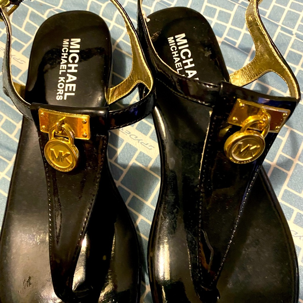 MK sandals. Worn once. Size 6. Black & White. Gold MK on top.